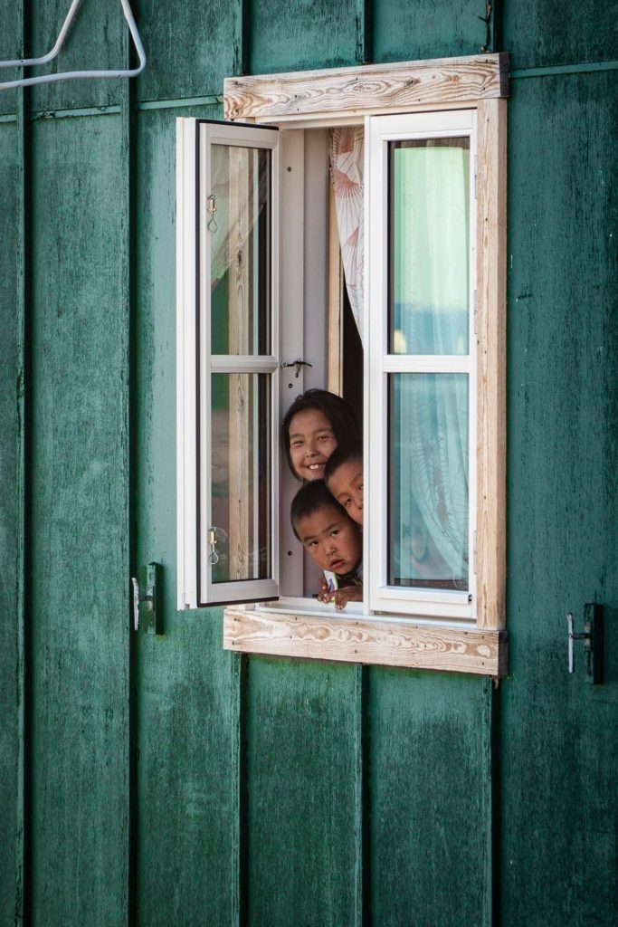 Children at the window, Greenland