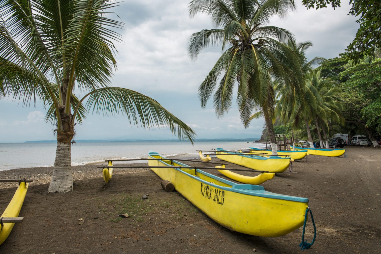 yellow boats in costa rica on a beach