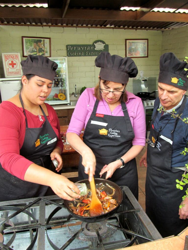 women in a cooking class in peru