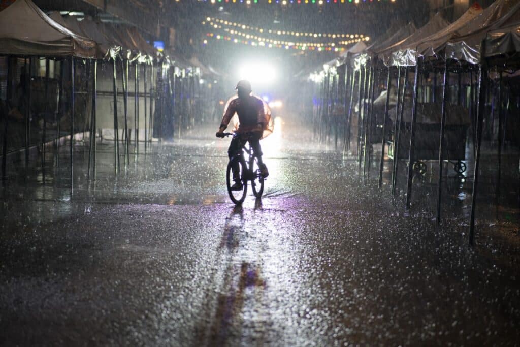 biking in the rain in bangkok, thailand