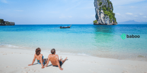 Couple on beach on thailand for honeymoon
