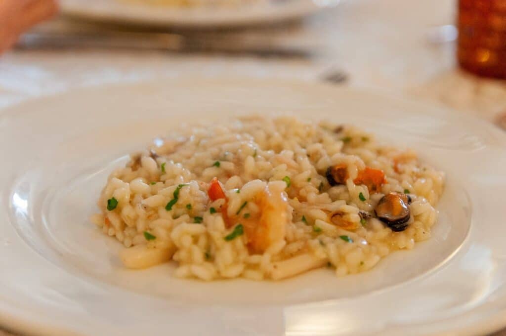 Seafood risotto. Italian main dish.