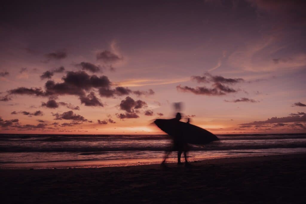 costa rica surfing dusk