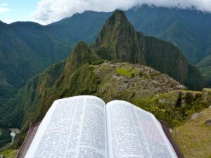 Reading Bible on the Mountain at Machu Picchu