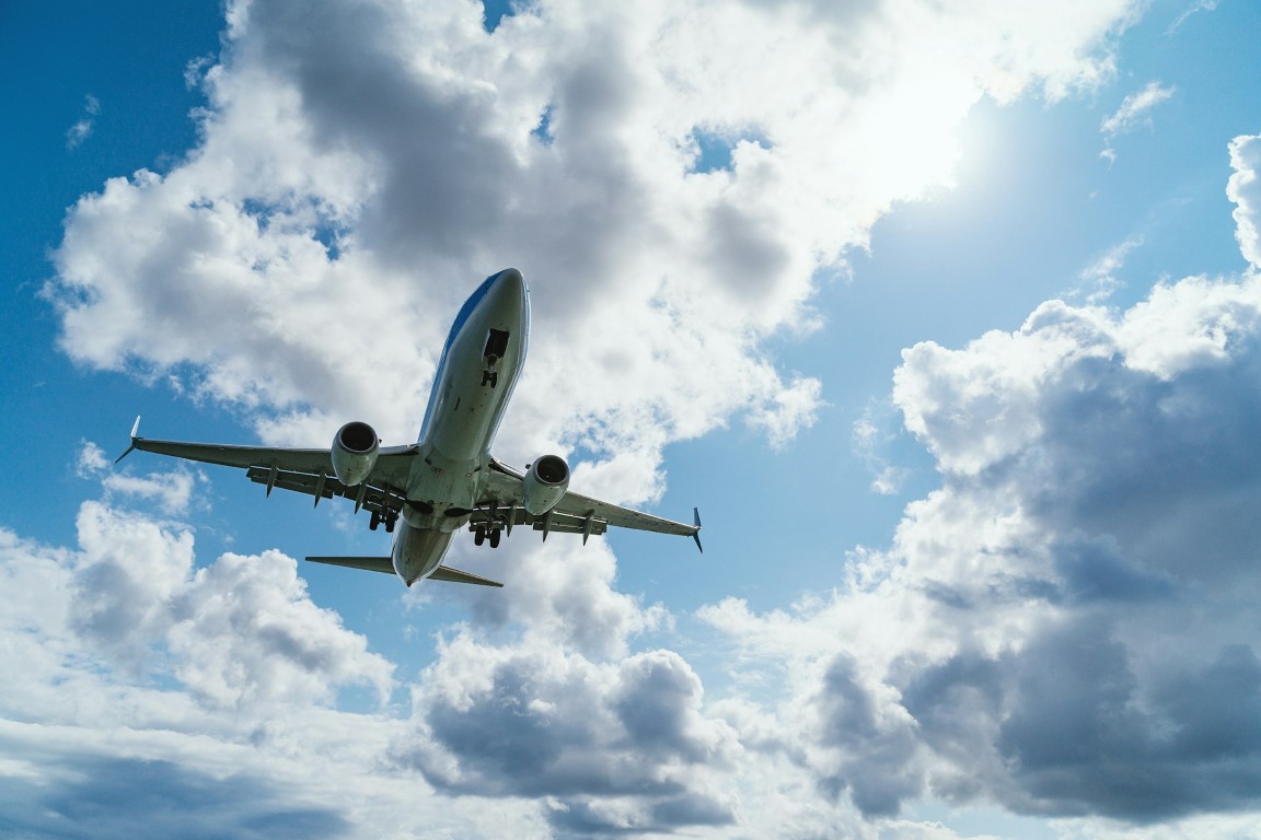 airplane and clouds in frame