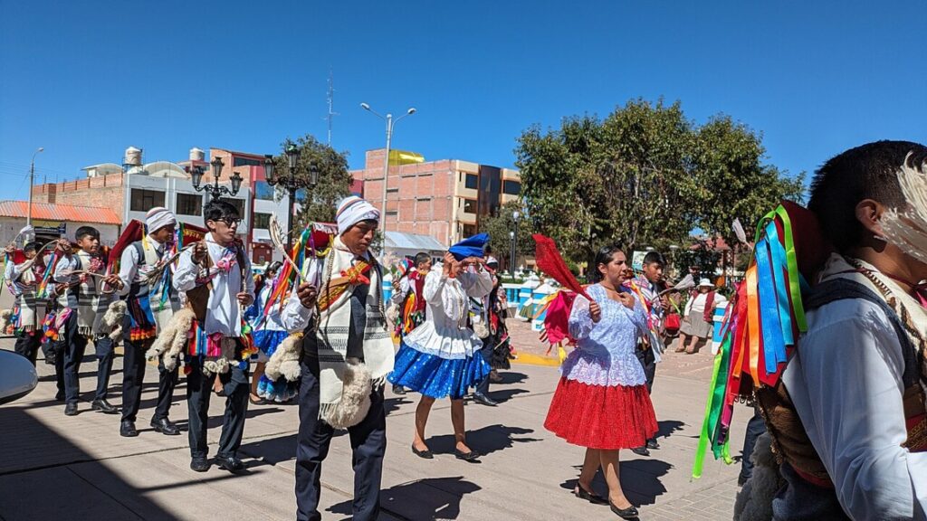 people parading on the streets of peru