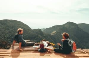travelers looking over a mountain